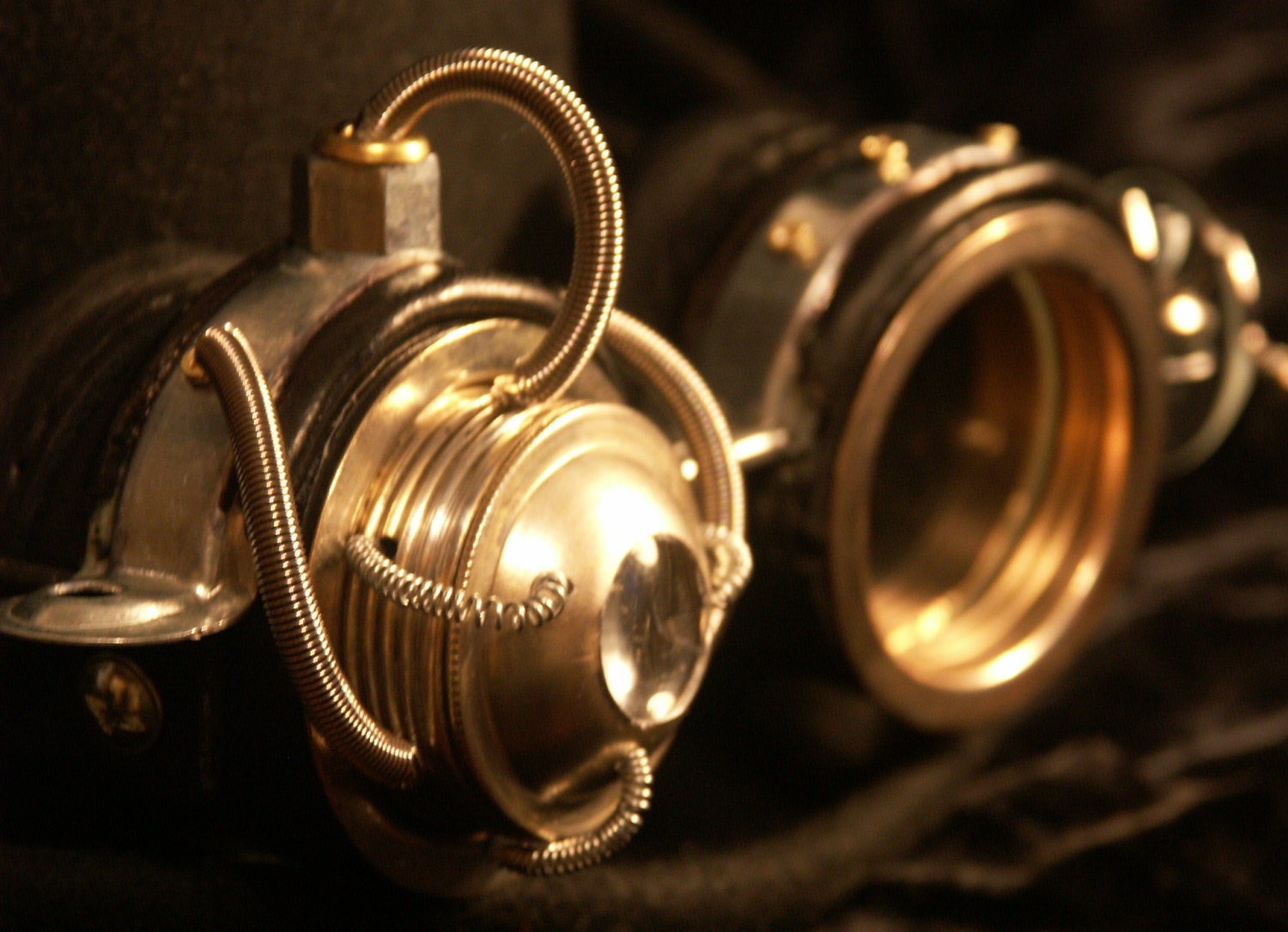 Steampunk goggles in black  leather and silver tone metal with moveable lens and monocle-style eyepiece. - TheTimeCabinet
