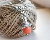 orange Necklace made of glass on silverplated chain. Complemented by silverplated spacers. bell. - BubiShop
