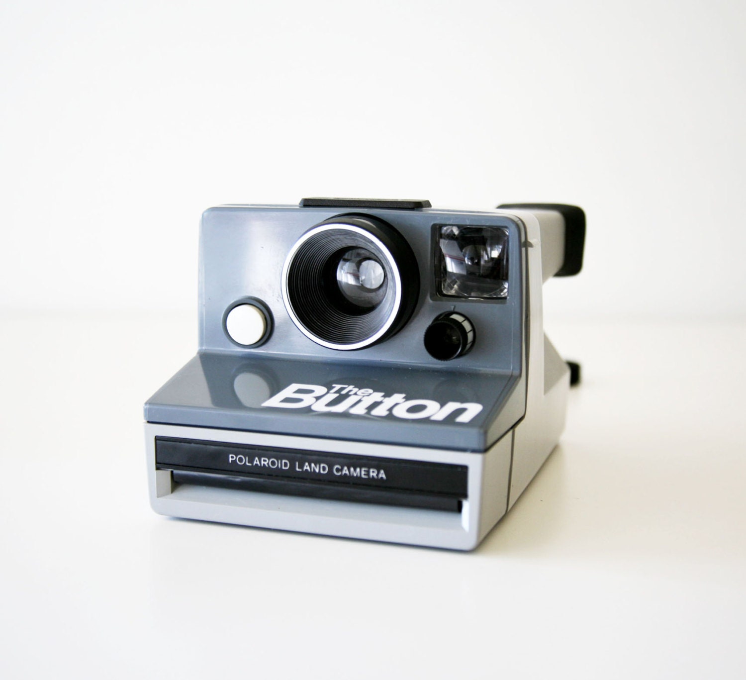 Items similar to Polaroid The Button, SX70 film type polaroid camera