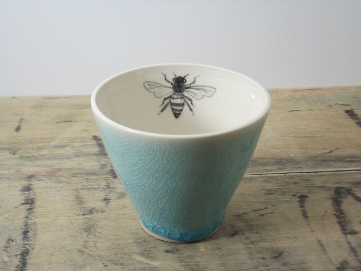 One Porcelain Blue Bee Tea Cup
