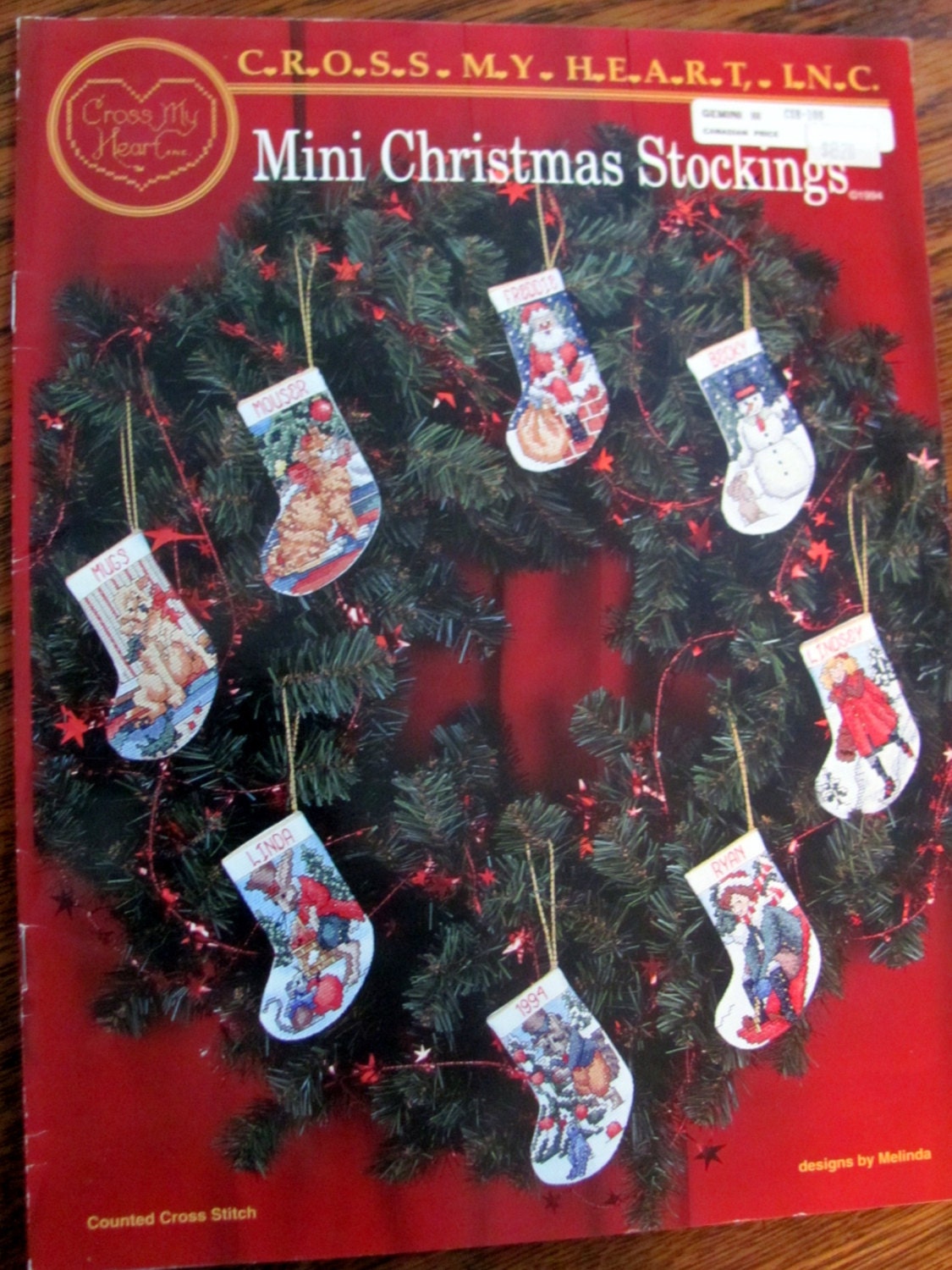 Mini Christmas Stockings Cross Stitch by OnceUponAnHeirloom