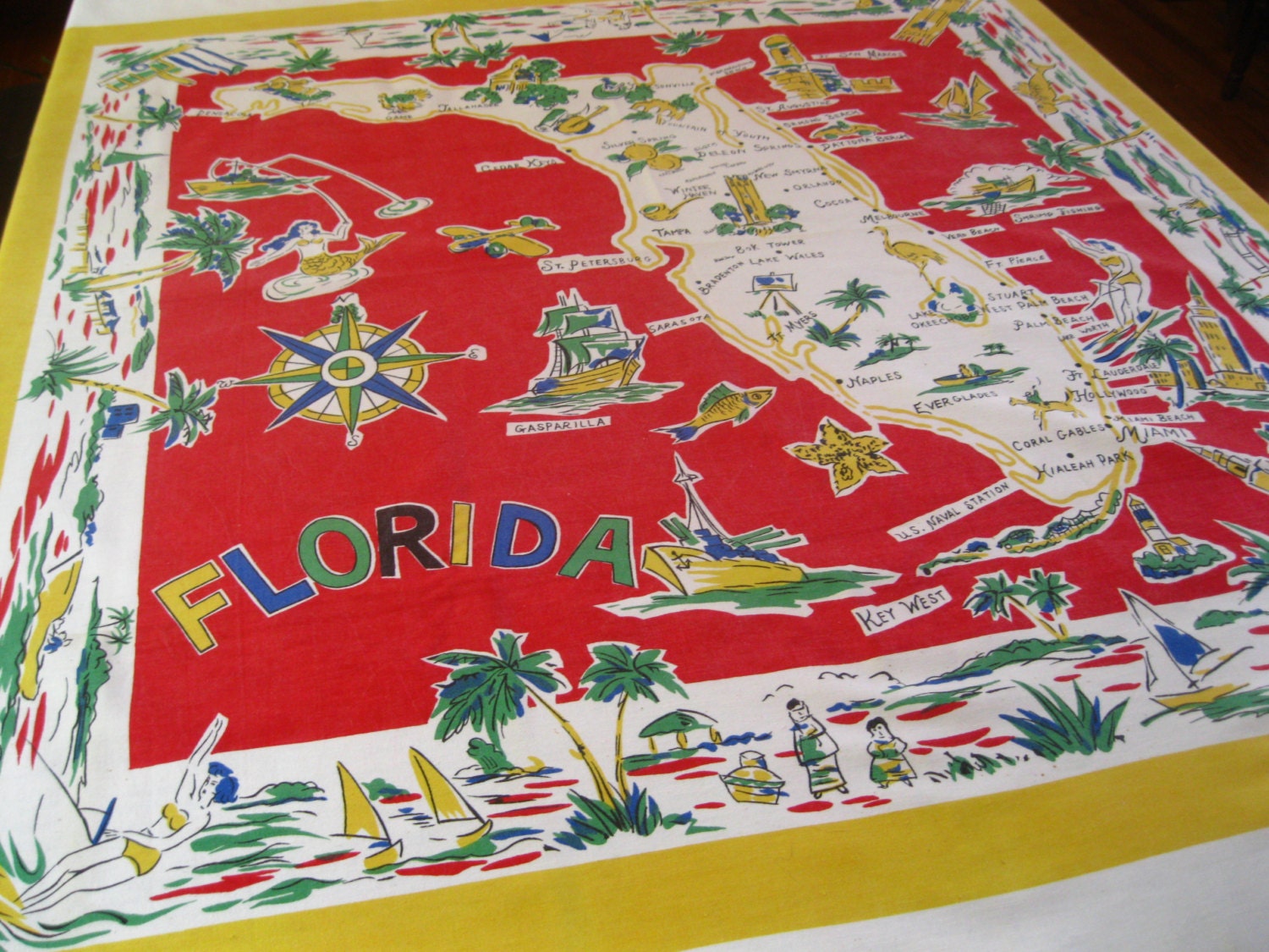 Vintage Florida tablecloth with flamingos, palm trees and bathing beauties  - 1950s