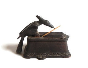 Cast Iron Woodpecker Toothpick Holder by aestheticallyantique