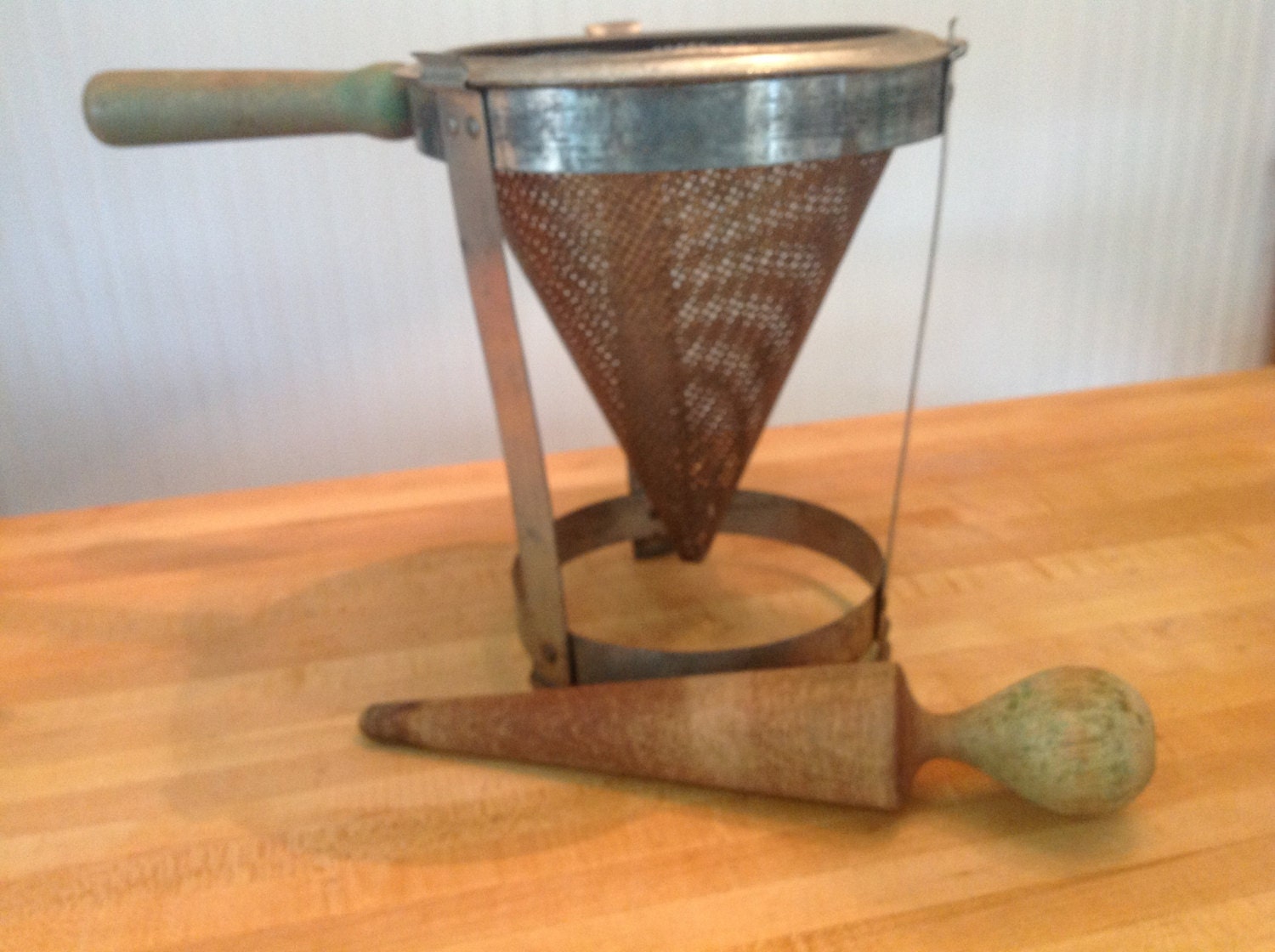 Vintage conical jelly strainer with pestle