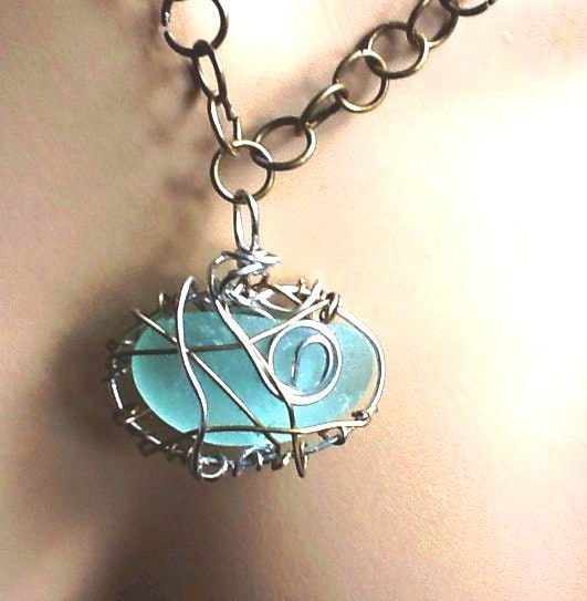 Dazzling jellybean seaglass, bronze and silver wire wrapped pendant/necklace - Thesnowrose