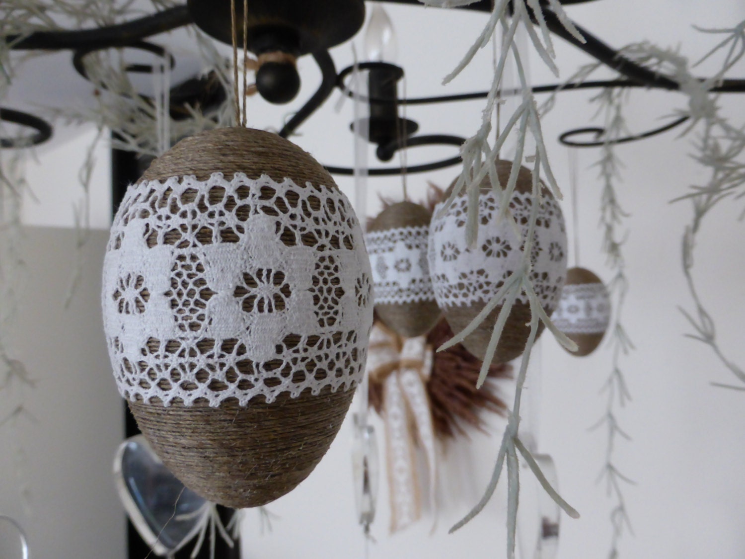 Real goose eggs - blown decorated with natural flax and cotton lace