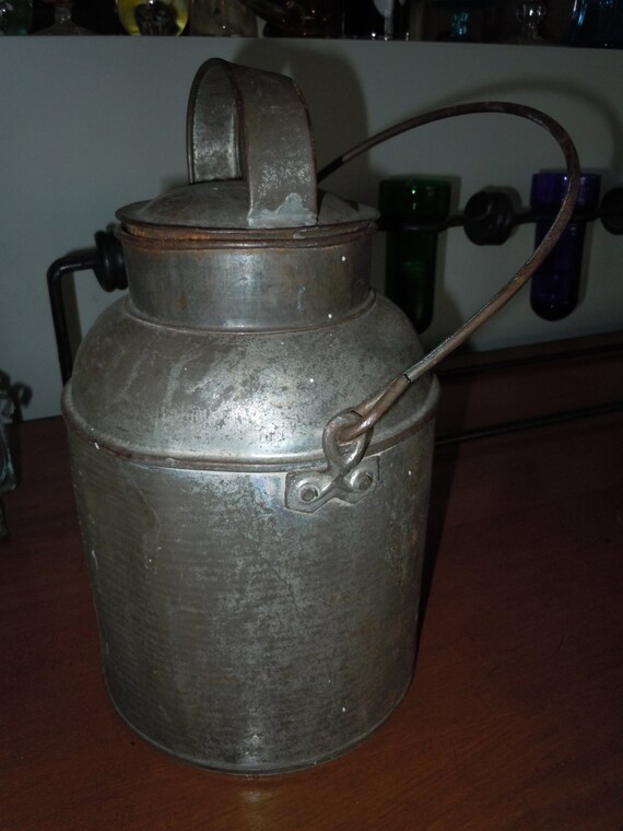 Items similar to Vintage Metal Milk or Water Jug on Etsy