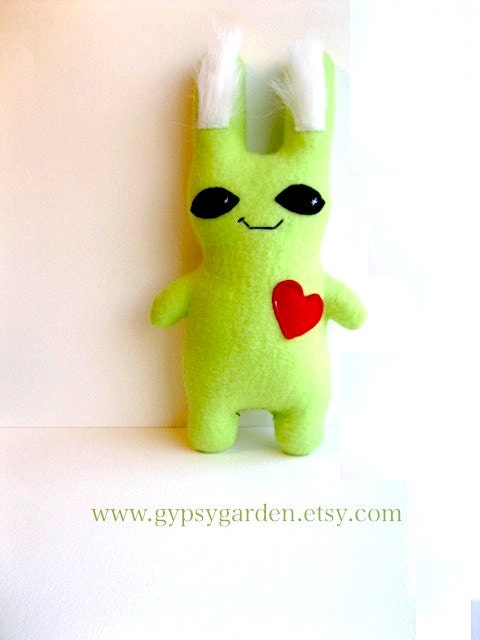 green alien stuffed toy