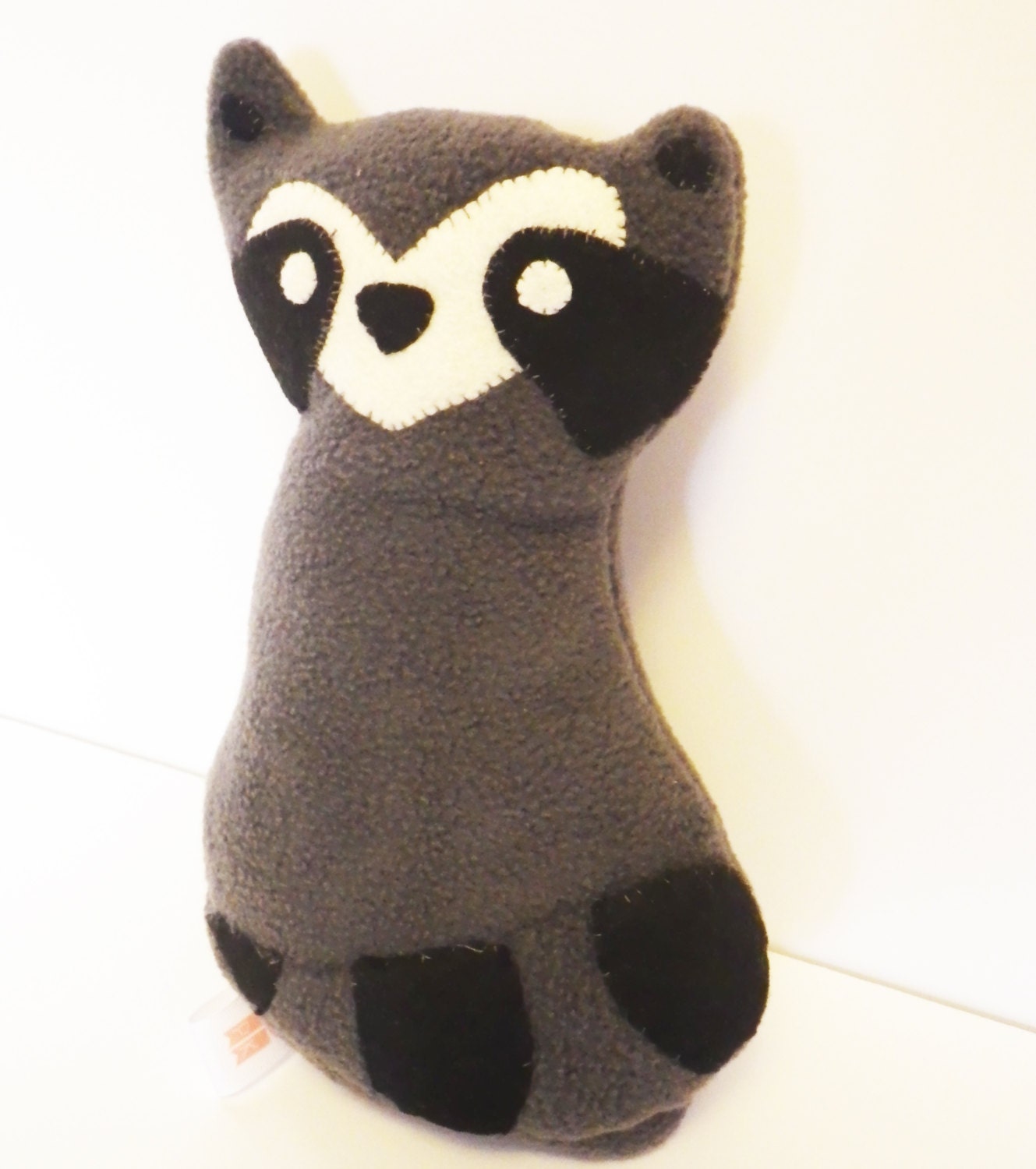 large stuffed raccoon