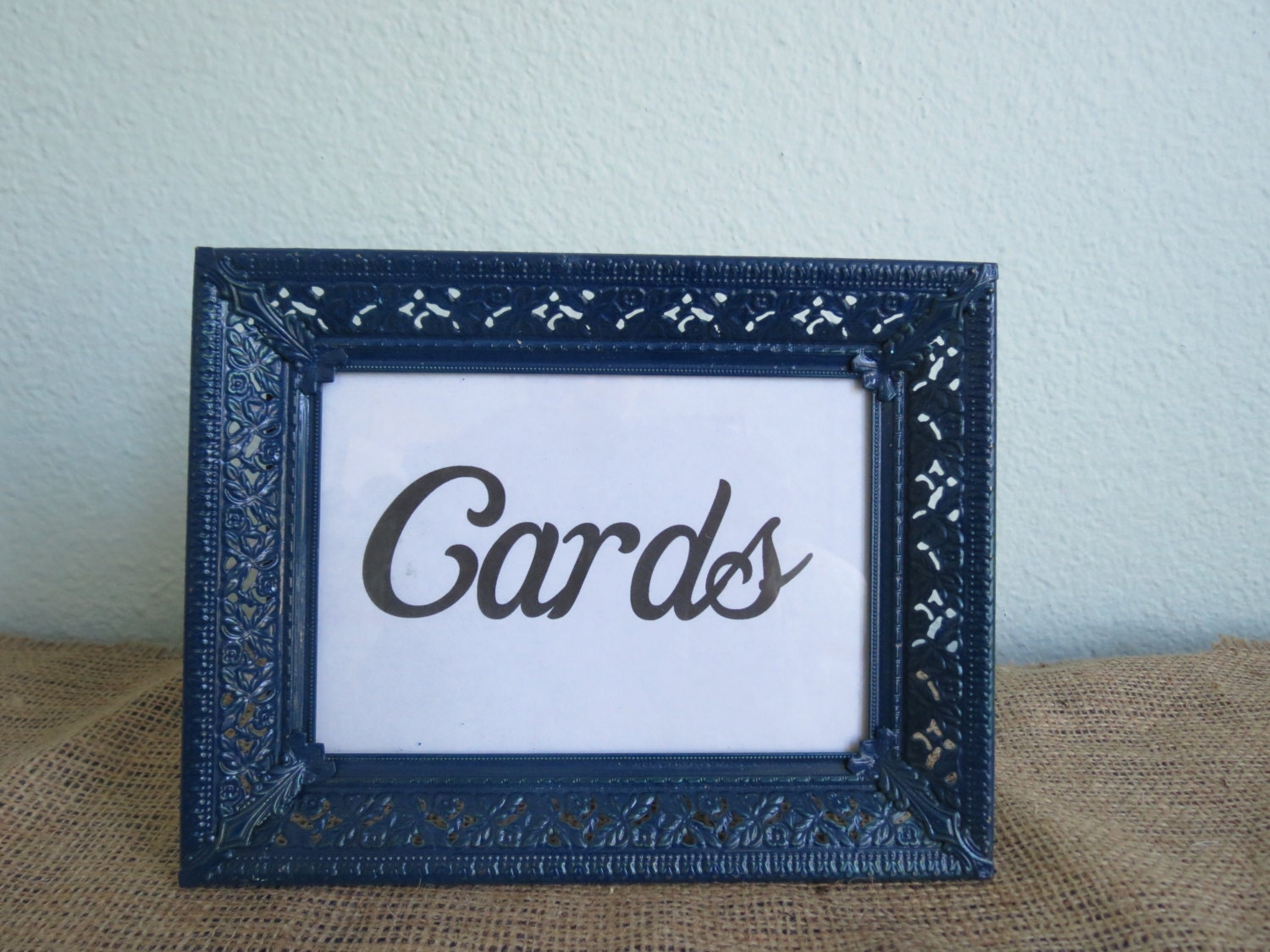Metal 5x7 picture frame painted navy blue by atasteofeverything
