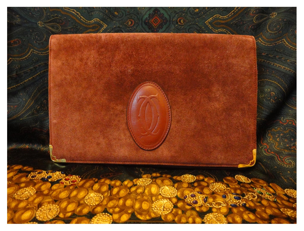 Vintage Cartier suede document clutch purse with embossed logo. A rare purse from must de Cartier collection