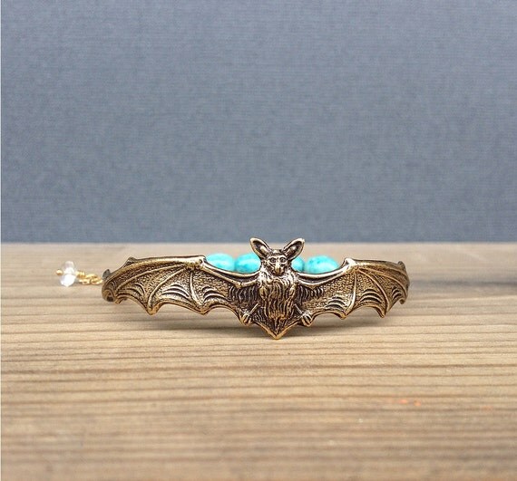 gold bat bracelet with turquoise blue by cravejewelrydesign