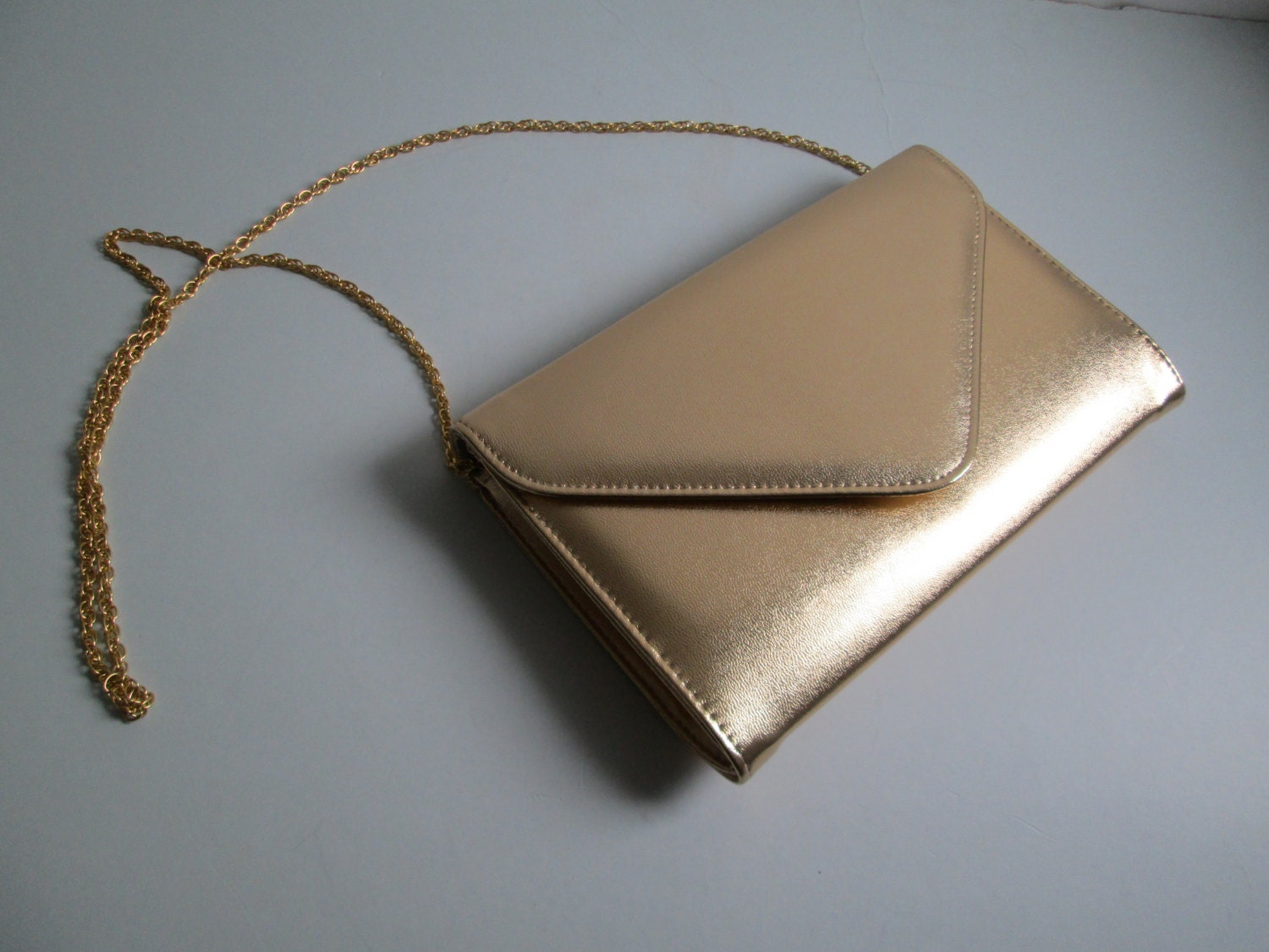 gold envelope purse