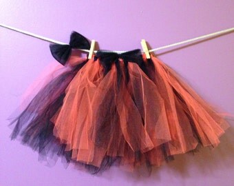 adult orange and black tutu