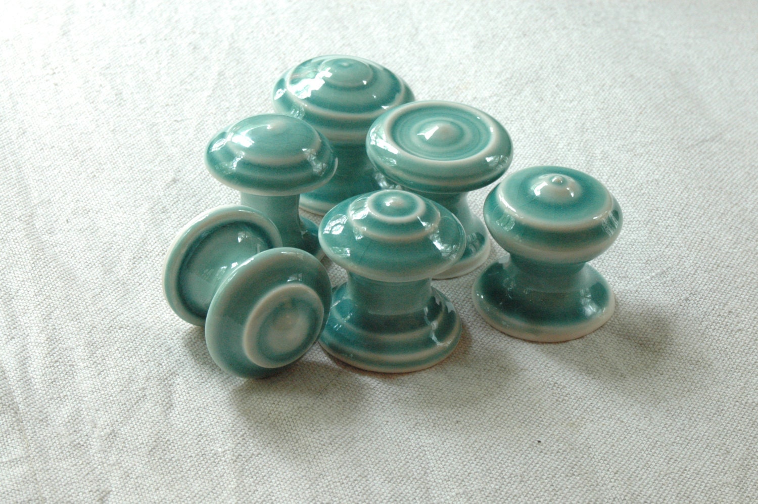 Ceramic handmade knobs in blue green by BakedNGlazed