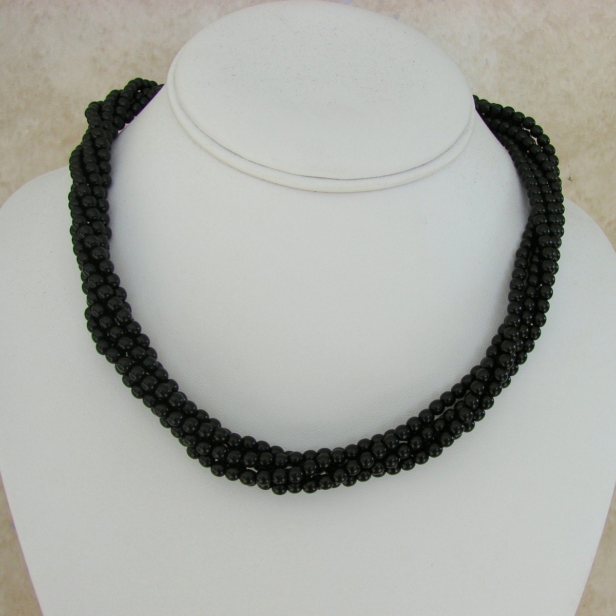 Napier Black Glass Twisted Bead Necklace Goldtone