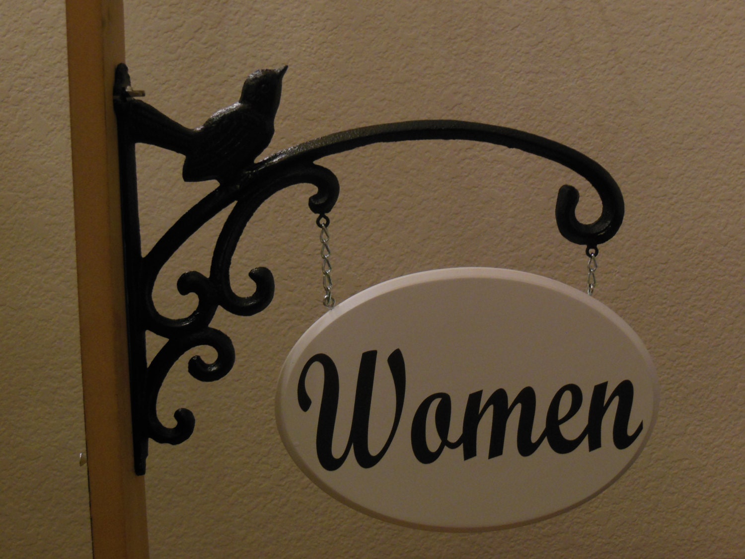 Vintage porcelain women restroom sign