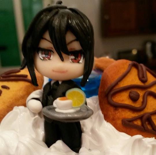 Black Butler tea jar with handmade polymer clay by