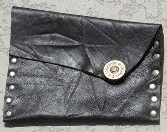 the pouch leather clutch