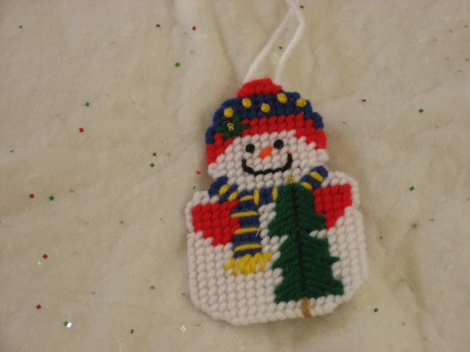 Snowman with a Christmas Tree Ornament