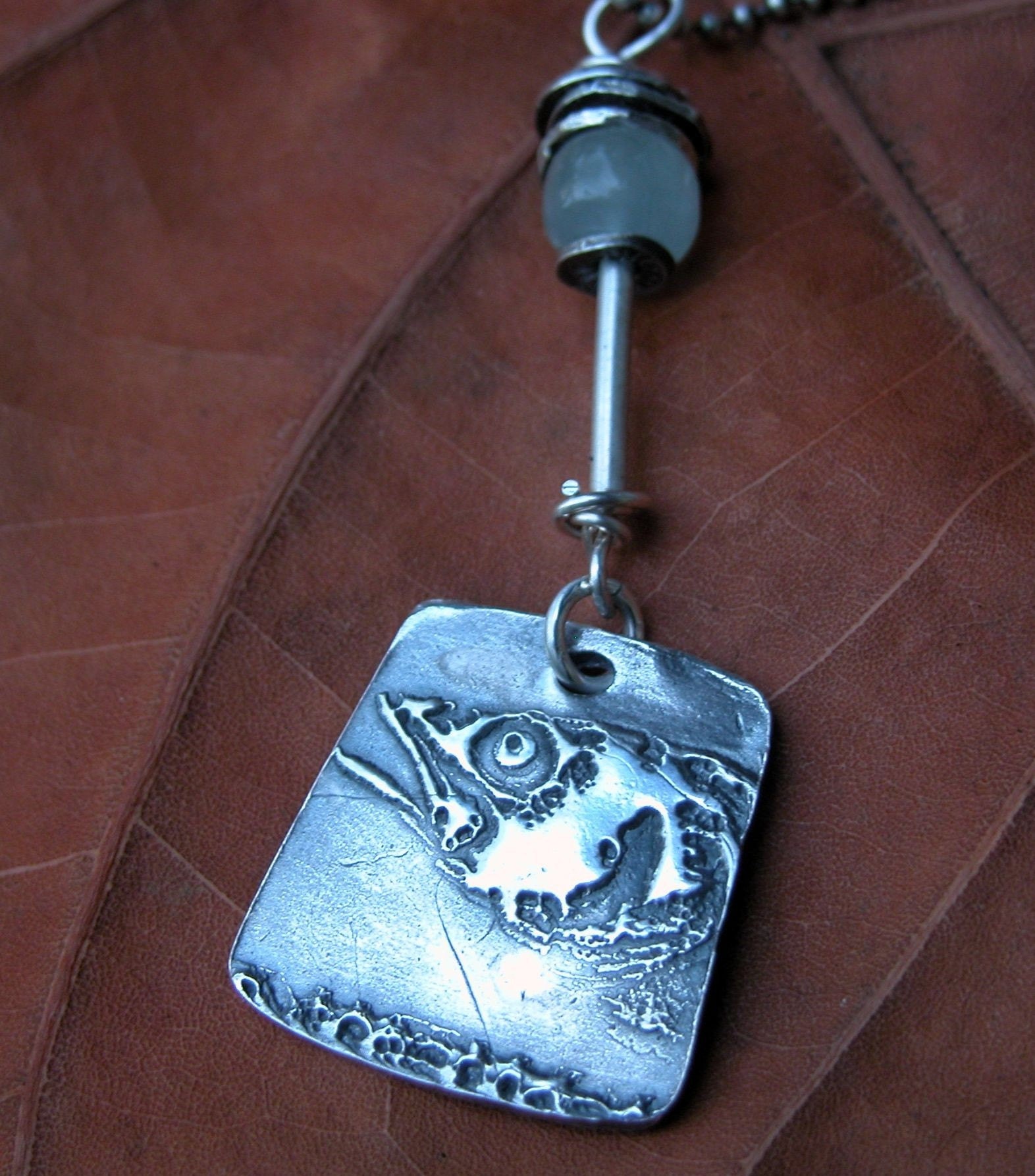 fish face pendant