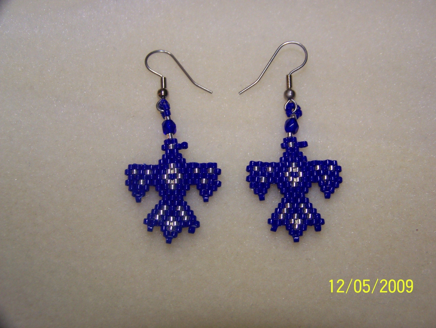 Beaded  Blue and  Silver Thunderbird earrings