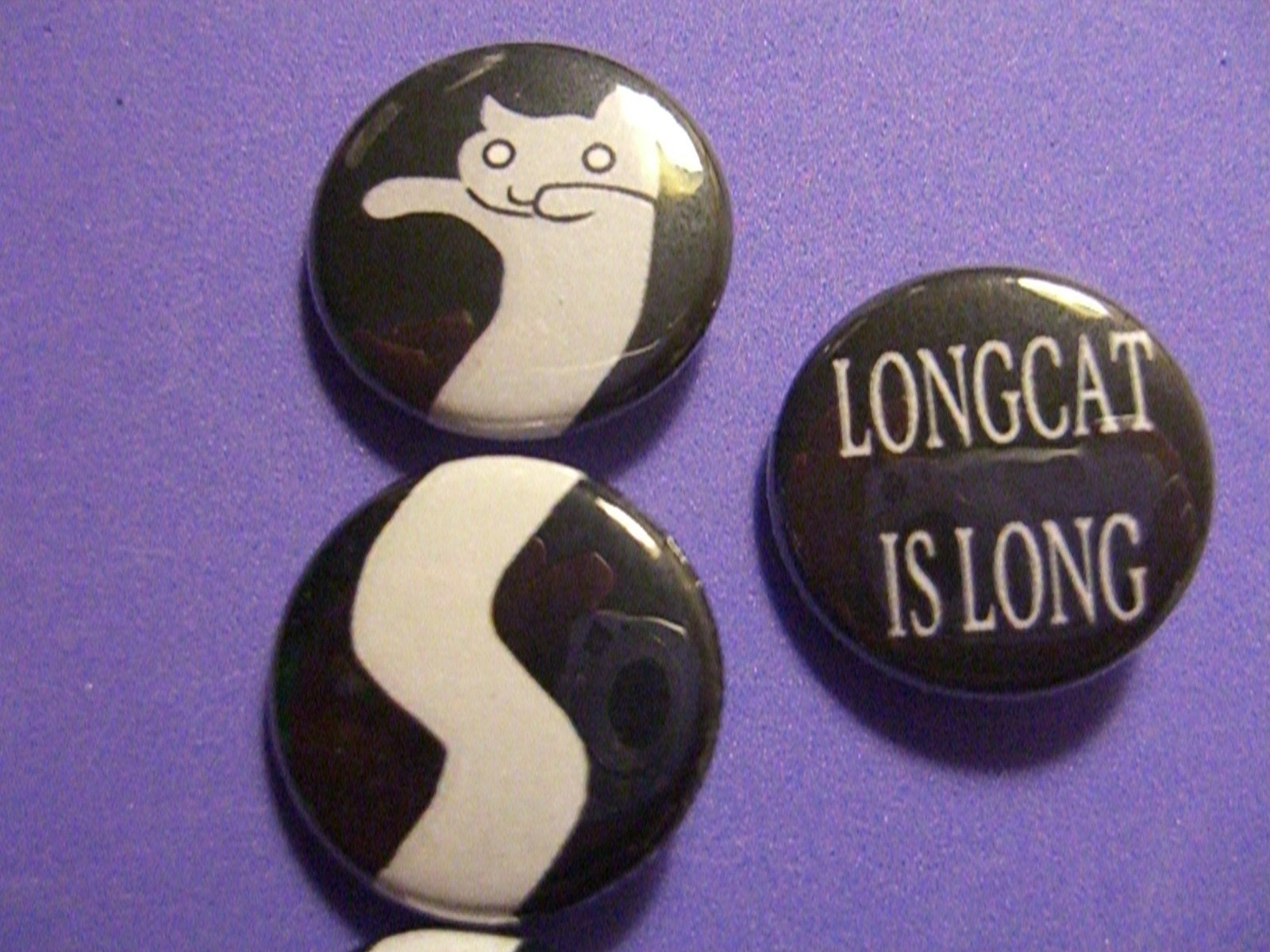 The Awesome Longcat Button Set.