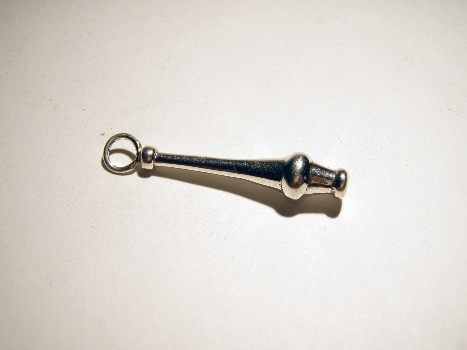 Silver Radical Fish Juggling Club Pendant