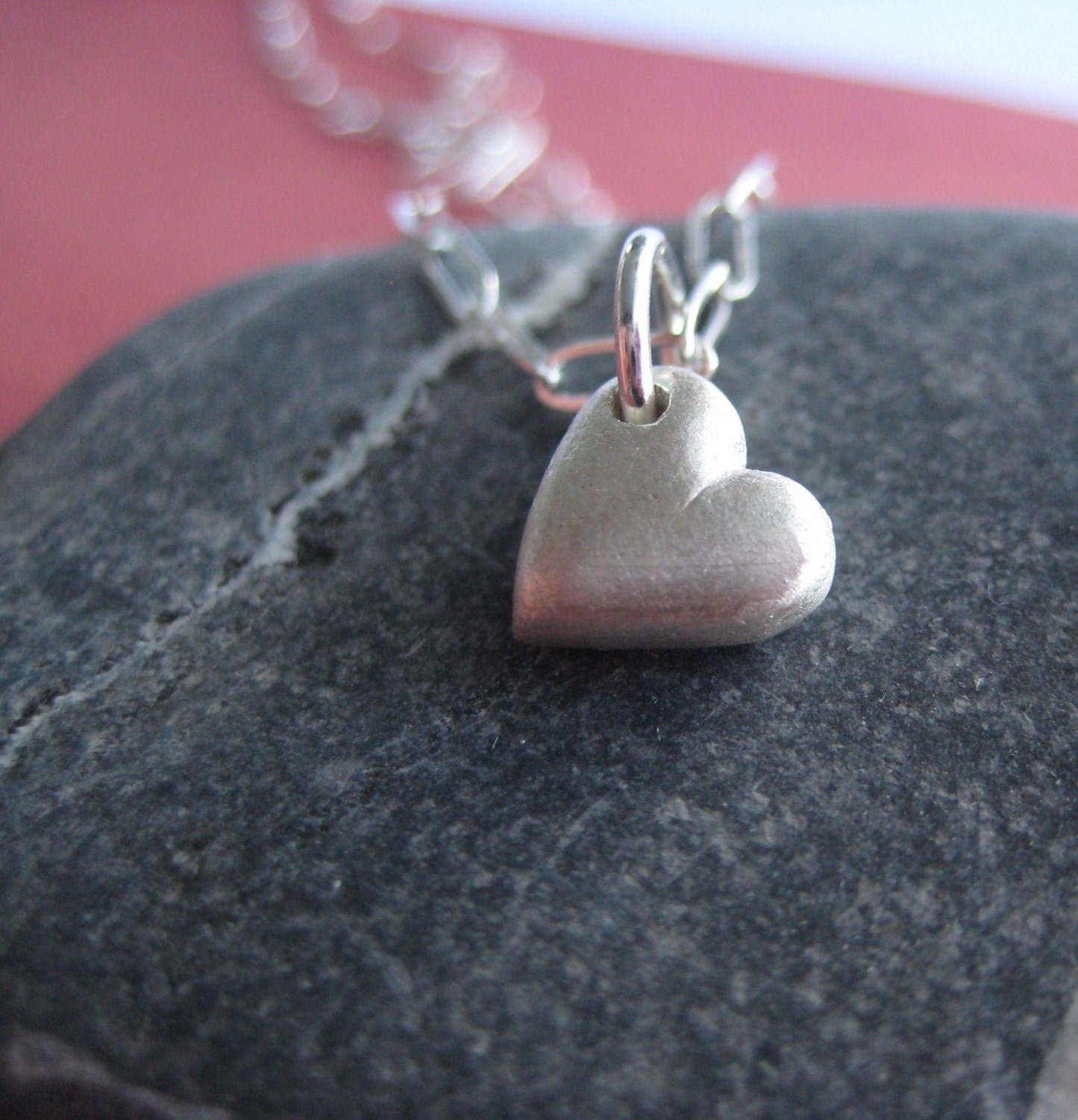 i carry your heart - tiny handmade charm sculpted with pure silver