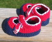 Knitted red, white and blue baby booties