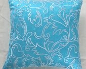 turquoise blue silk throw pillow and decorative cushion with moroccan/marakesh inspired white embroidery