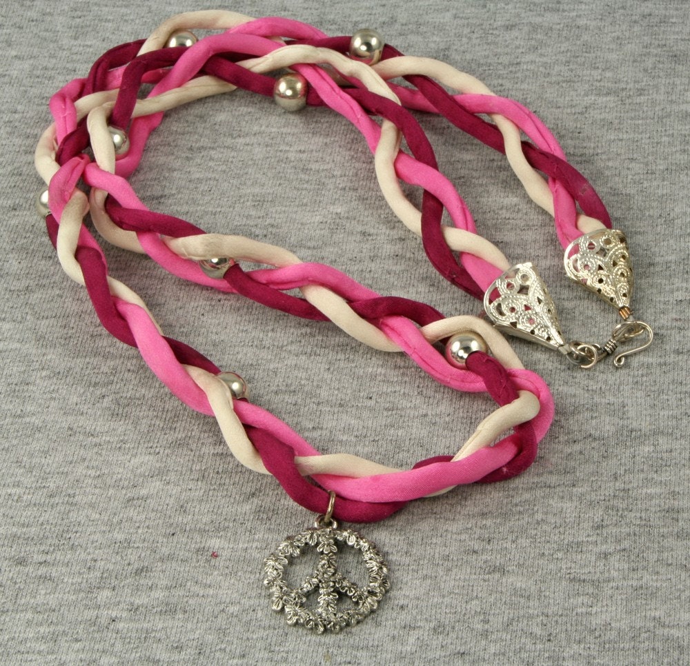 Code Pink - Pink Red White Braided Ribbon Necklace with Floral Silver Peace Sign