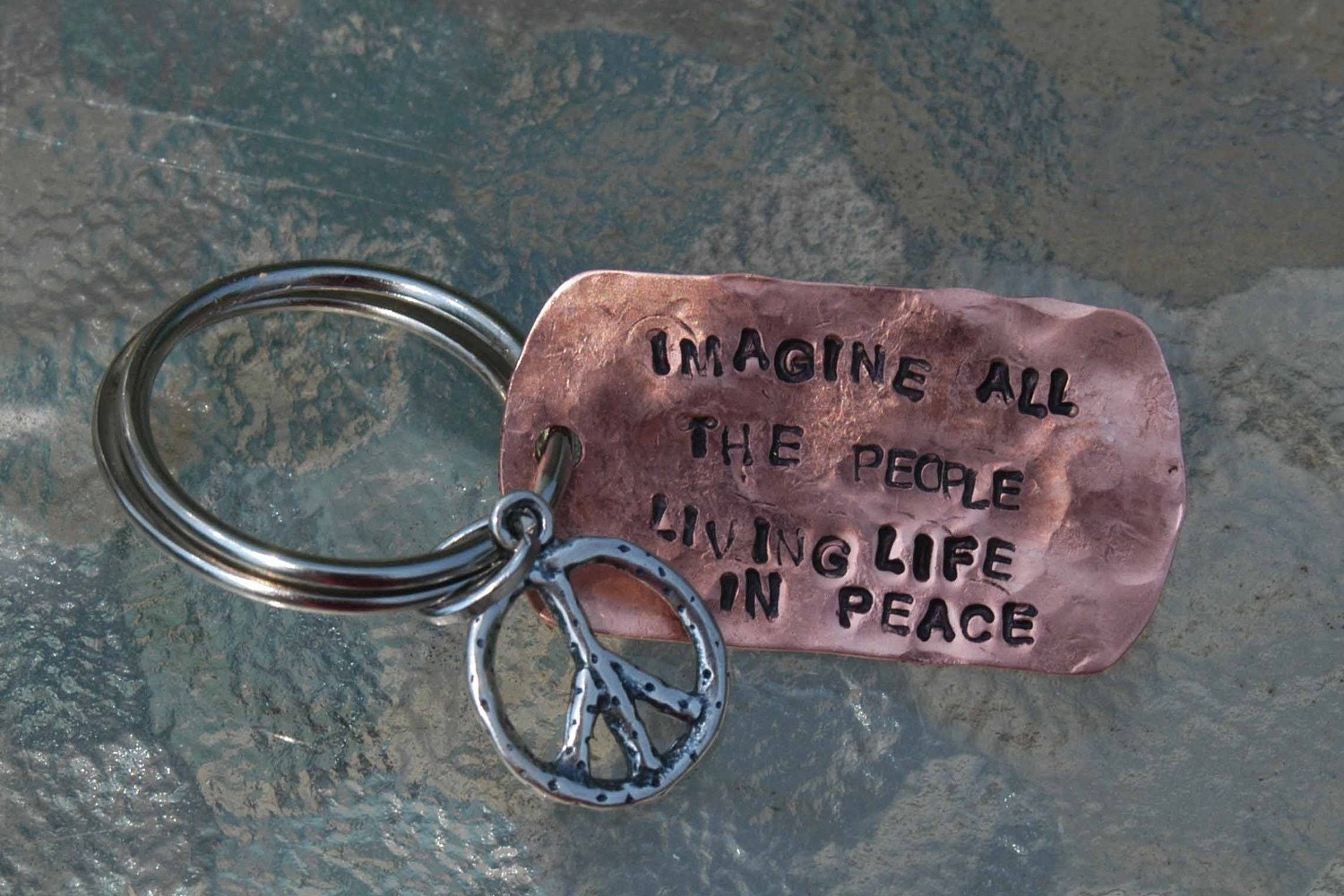 Hand Stamped Copper Dog Tag Keyring  With Sterling Artisan Peace Sign Charm And Lyrics From Imagine - By Inspired Jewelry Designs
