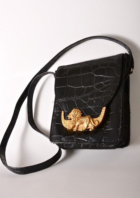 LIONS DEN a black messenger style shoulder bag incredibly stylish with rustic bold lion