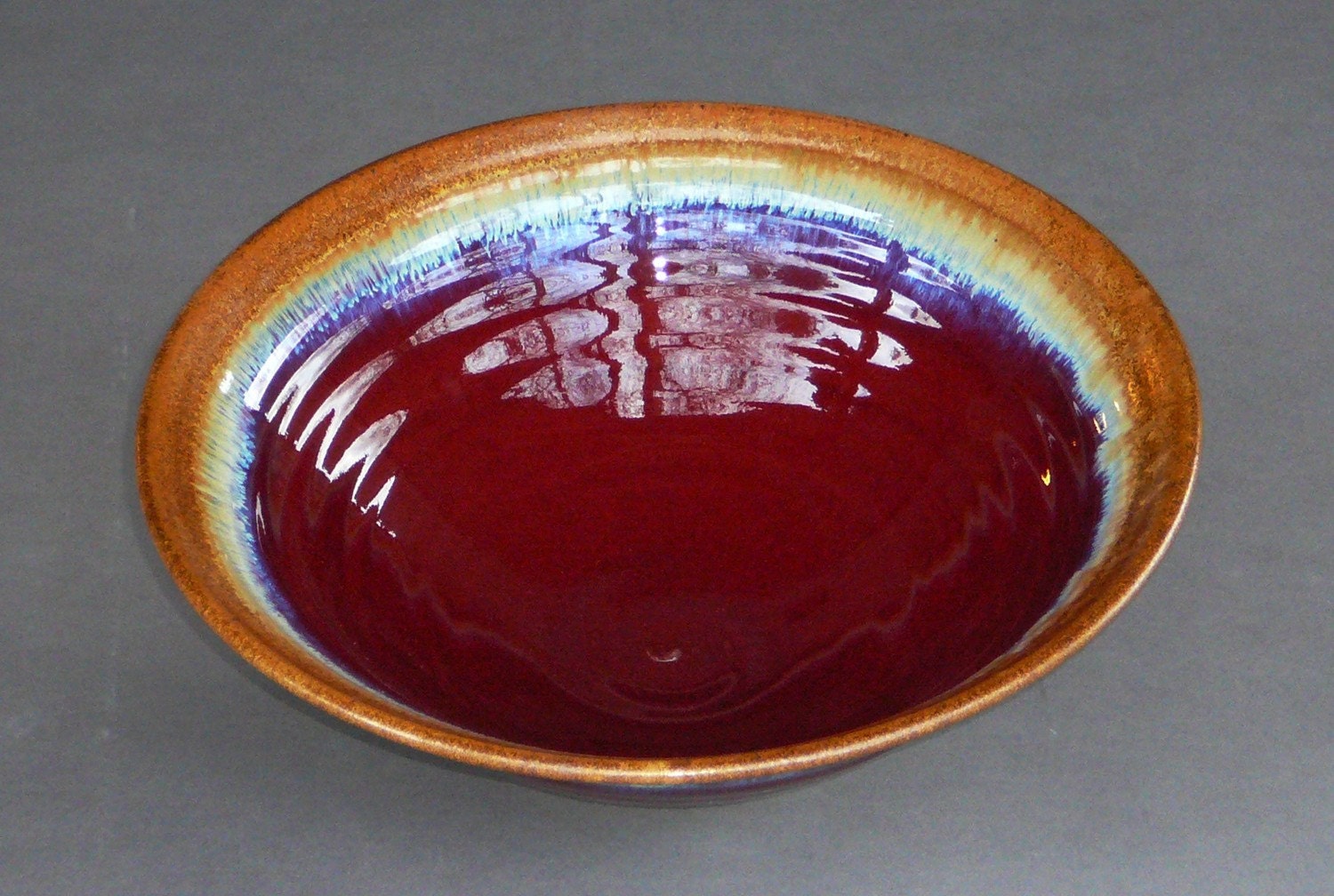 Handmade copper red pottery bowl