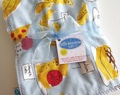 La Patisserie baby blanket backed with ivory minkee dot