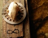 Cat skull and repurposed wood