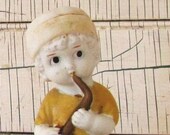 large vintage frozen charlotte horn player