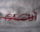 Red hairslide or shawlpin