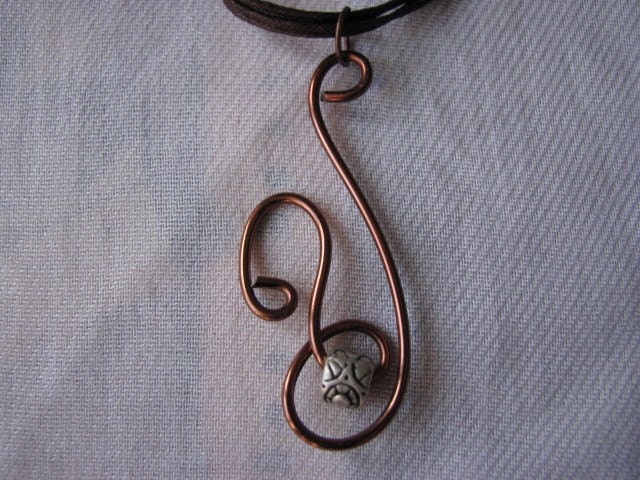 Brown wire pendant.