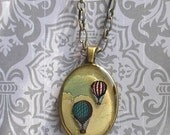 Vintage floating double hot air balloons resin pendant NECKLACE in ANTIQUE BRASS