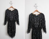 1970s vintage black silk & sequin vamp dress