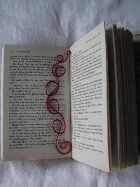 Red curly wire bookmark