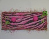 Stylin' pink and green hat rack wall plaque