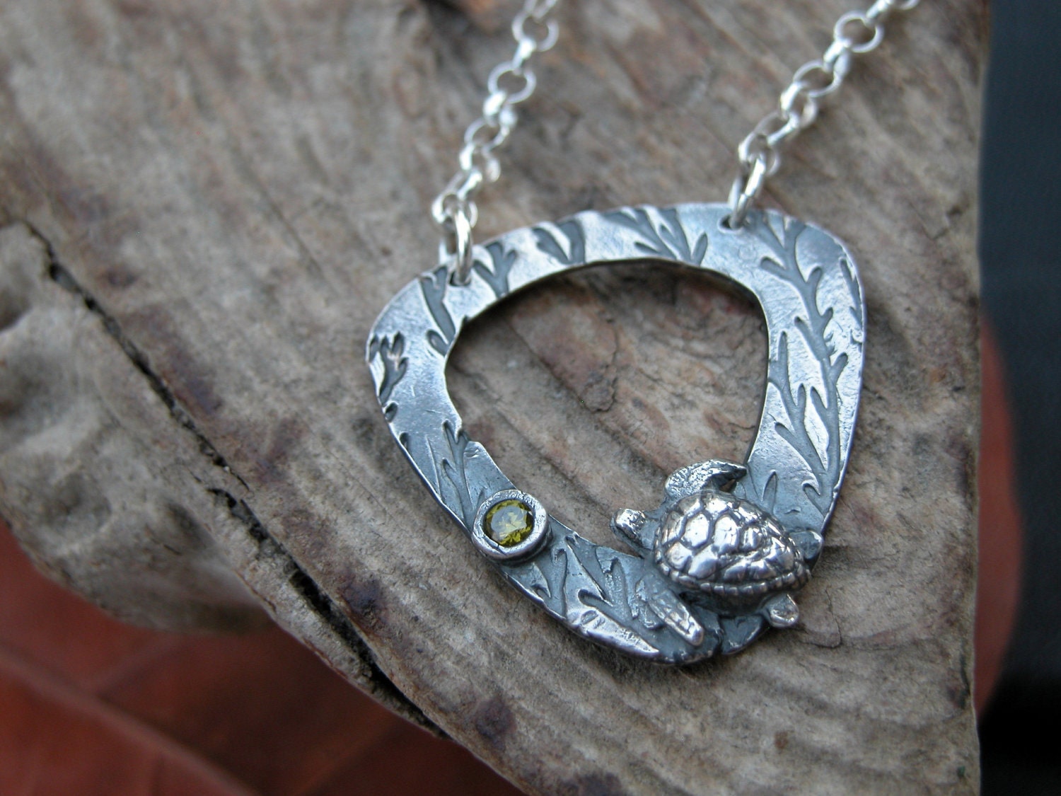 Fine silver turtle with green cubic zirconia necklace