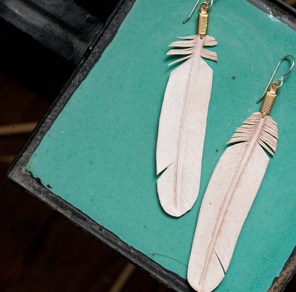 white wash hand craved leather feather