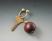 Amulet Key Ring - Natural Seed from the Amazon Rainforest and Brass