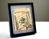 The Letter C: book pocket original artwork in display case, ink drawing & collage