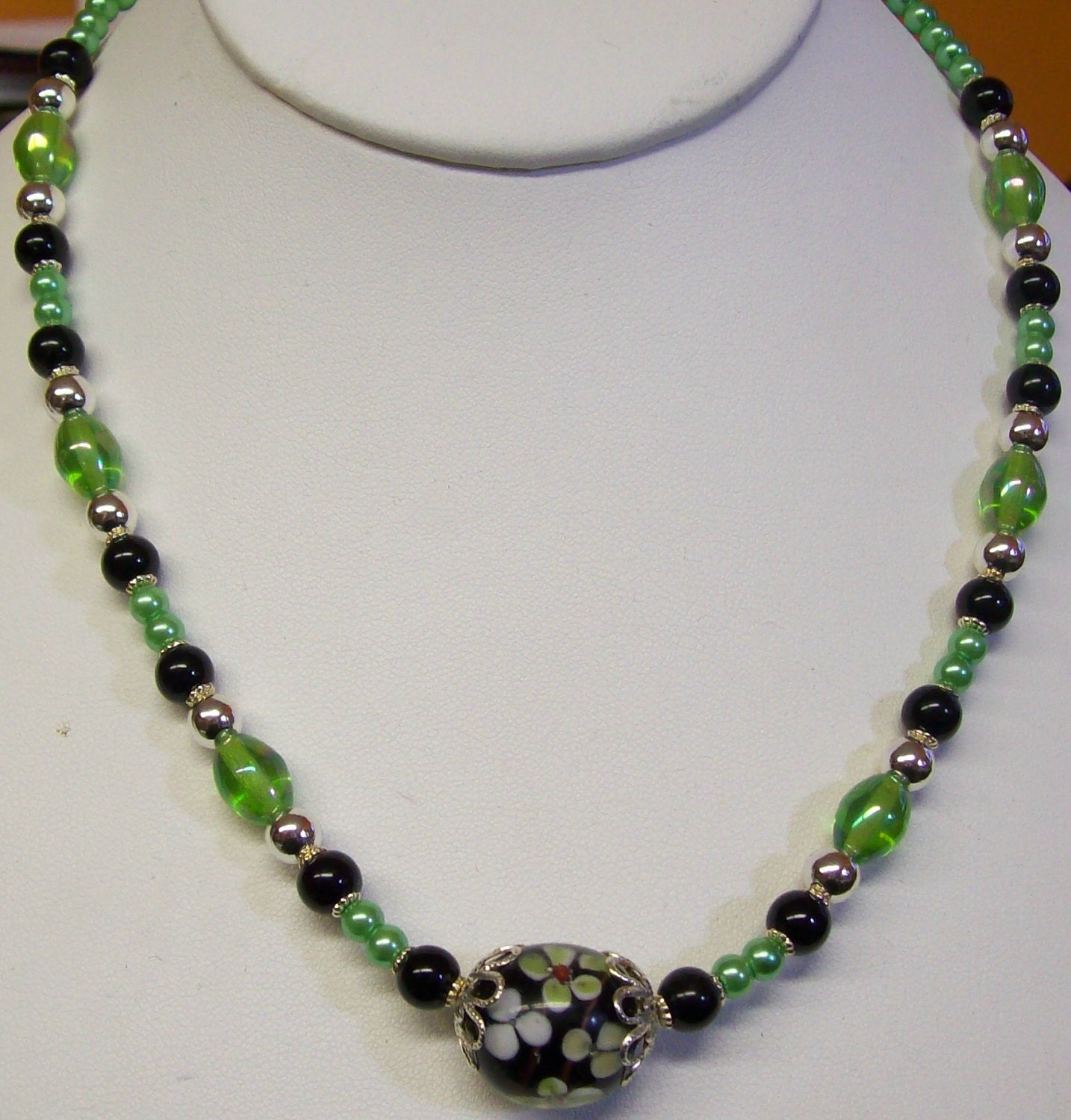 Green, Black and Silver Necklace with chunky focal bead and Matching Earrings