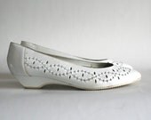 size 8.5 white leather cut out mini wedges. 80s revelations made in Brazil.